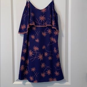 Navy romper with pink palm trees